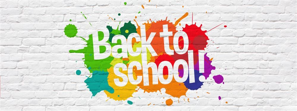 Artwork with the words "Back to School" displayed in paint splatter on top of a white brick background Artwork with the words "Back to School" displayed in paint splatter on top of a white brick background
